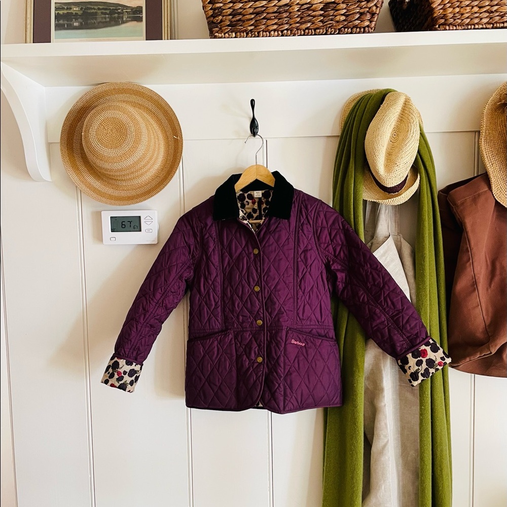 Classic girls’ quilted Barbour barn jacket.